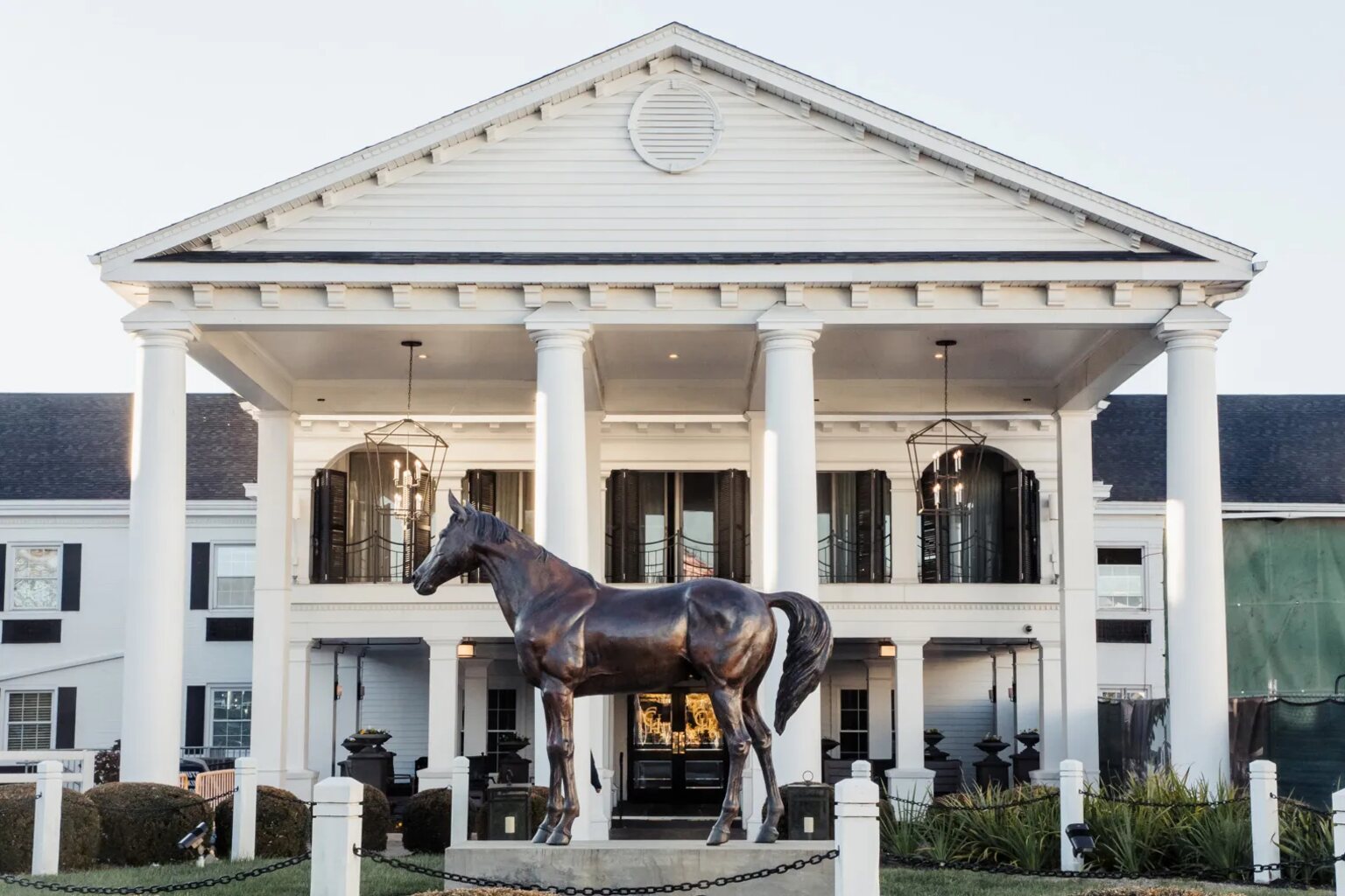 The Campbell House facade in Lexington with a bronze horse statue
